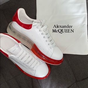 Alexander McQueen low top red and white sneakers